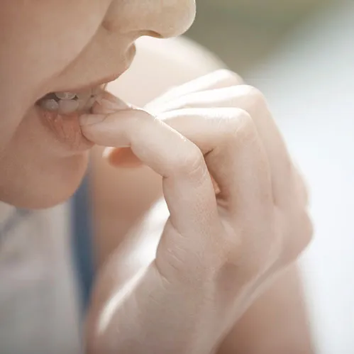 Person biting nails