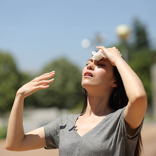 Dehydrated women under the sunlight