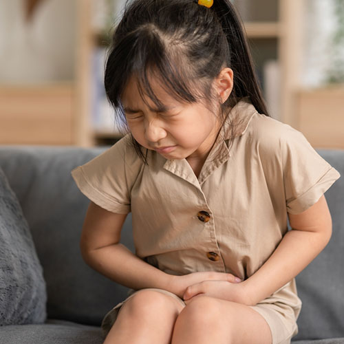 Girl bearing pan due to UTI